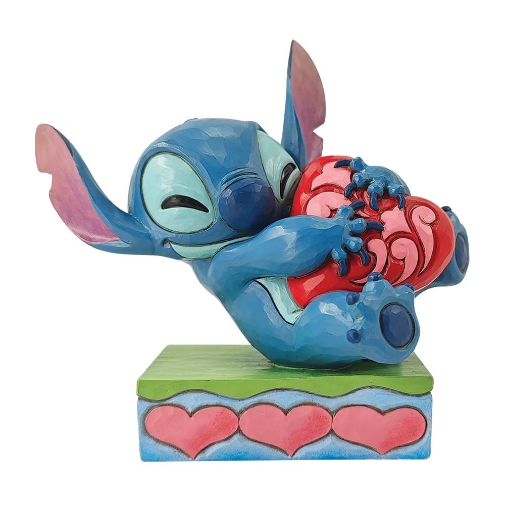 Stitch Hugging a Heart Figurine by Disney Traditions